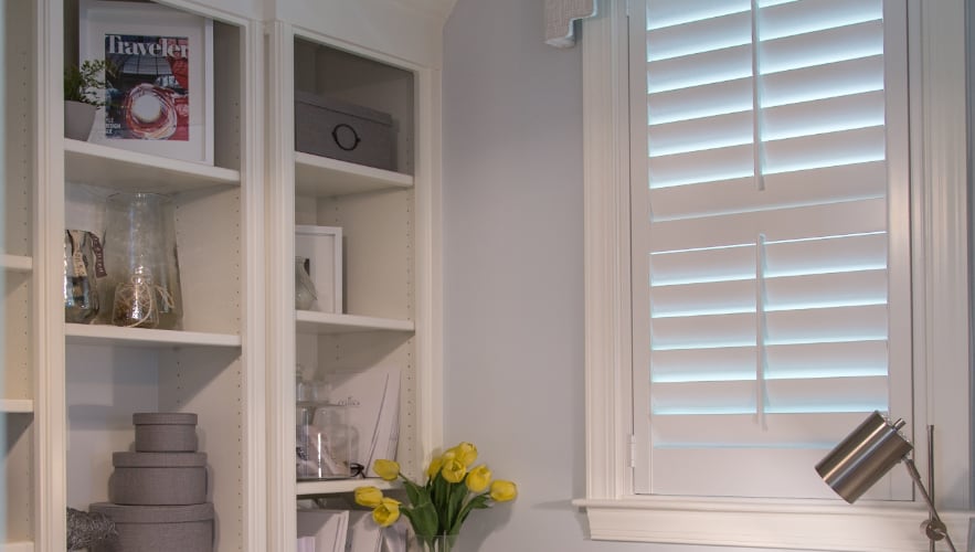 Plantation shutters in a home office